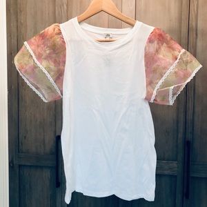 T with floral sleeves.